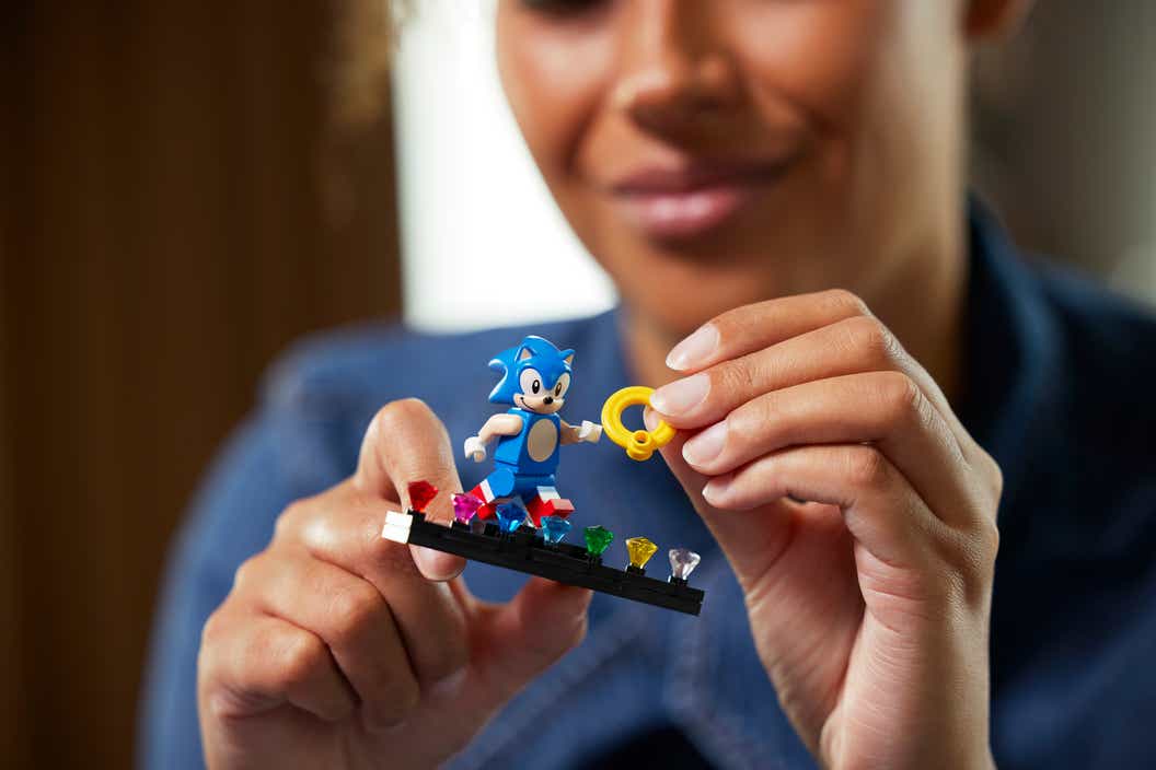 Close up of women building LEGO Ideas Sonic the Hedgehog Green Hill Zone set