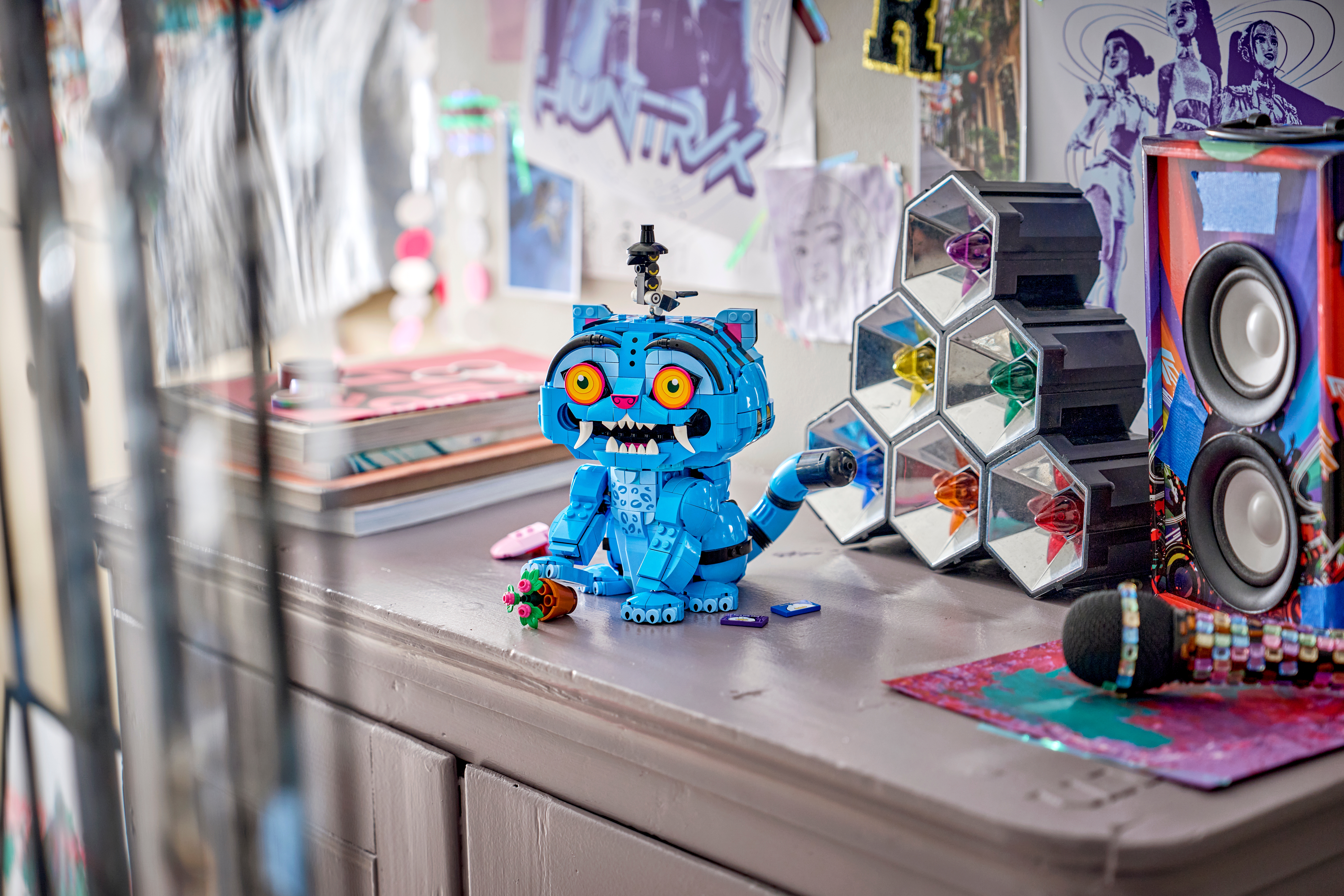 LEGO® KPop Demon Hunters Derpy Tiger and Sussie Bird - About Us