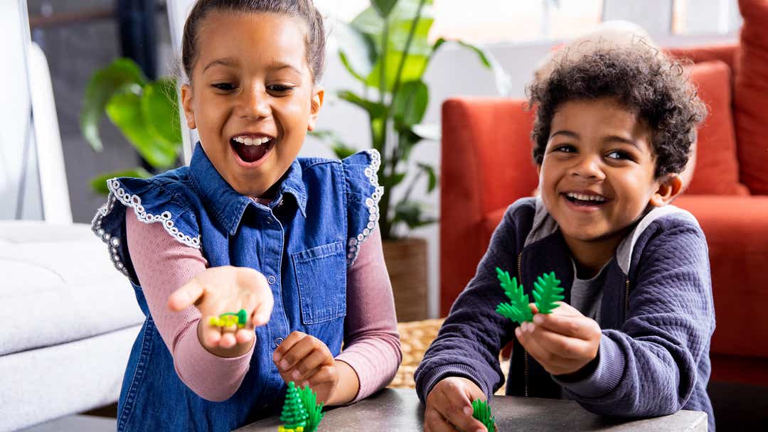Image of children holding LEGO leaf elements