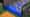 LEGO minifigure hands on a conveyor belt