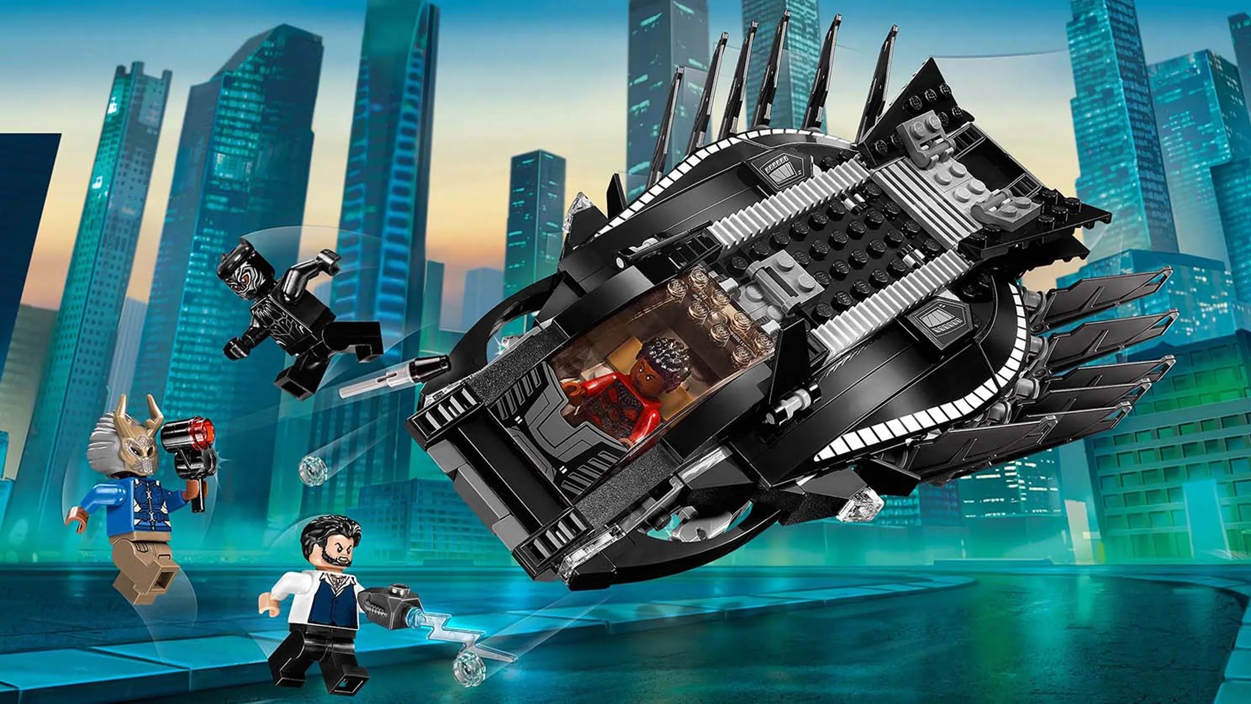 LEGO Super Heroes - 76100 Royal Talon Fighter Attack - Black Panther is in the cockpit of the Royal Talon Fighter with Nakia and fire stud shooters at Killmonger and Ulysses Klaue.