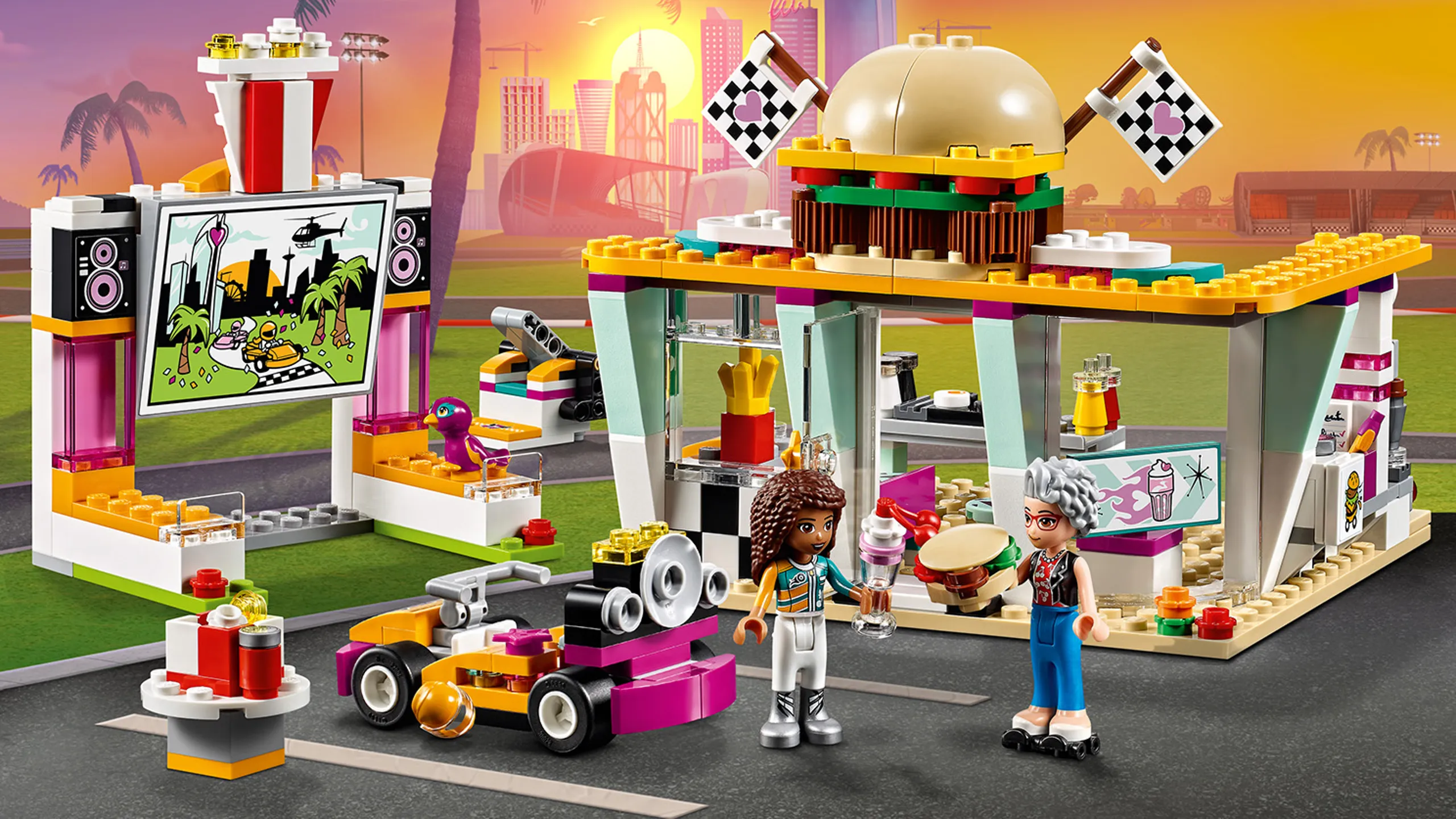 LEGO Friends - 41349 Drifting Diner - Andrea watches a movie at the drive in cinema and gets snacks from Dottie's Diner that sells drinks, fries, burgers and popcorn.