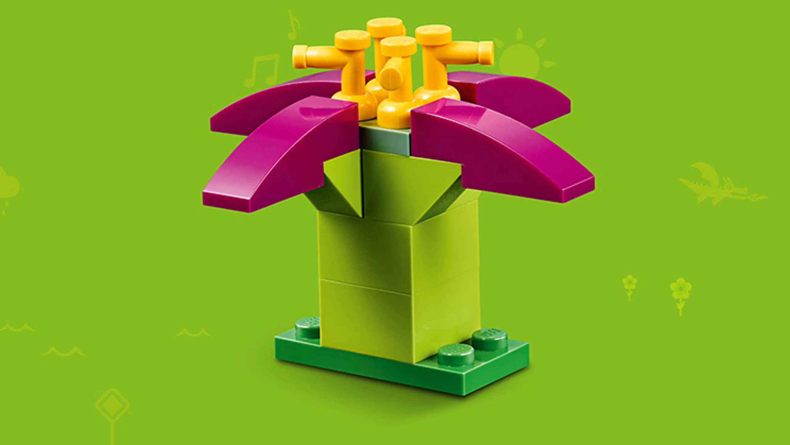 LEGO Classic Bricks Bricks Bricks - 10717 - Build a pretty flower with dark pink petals and orange stamen.