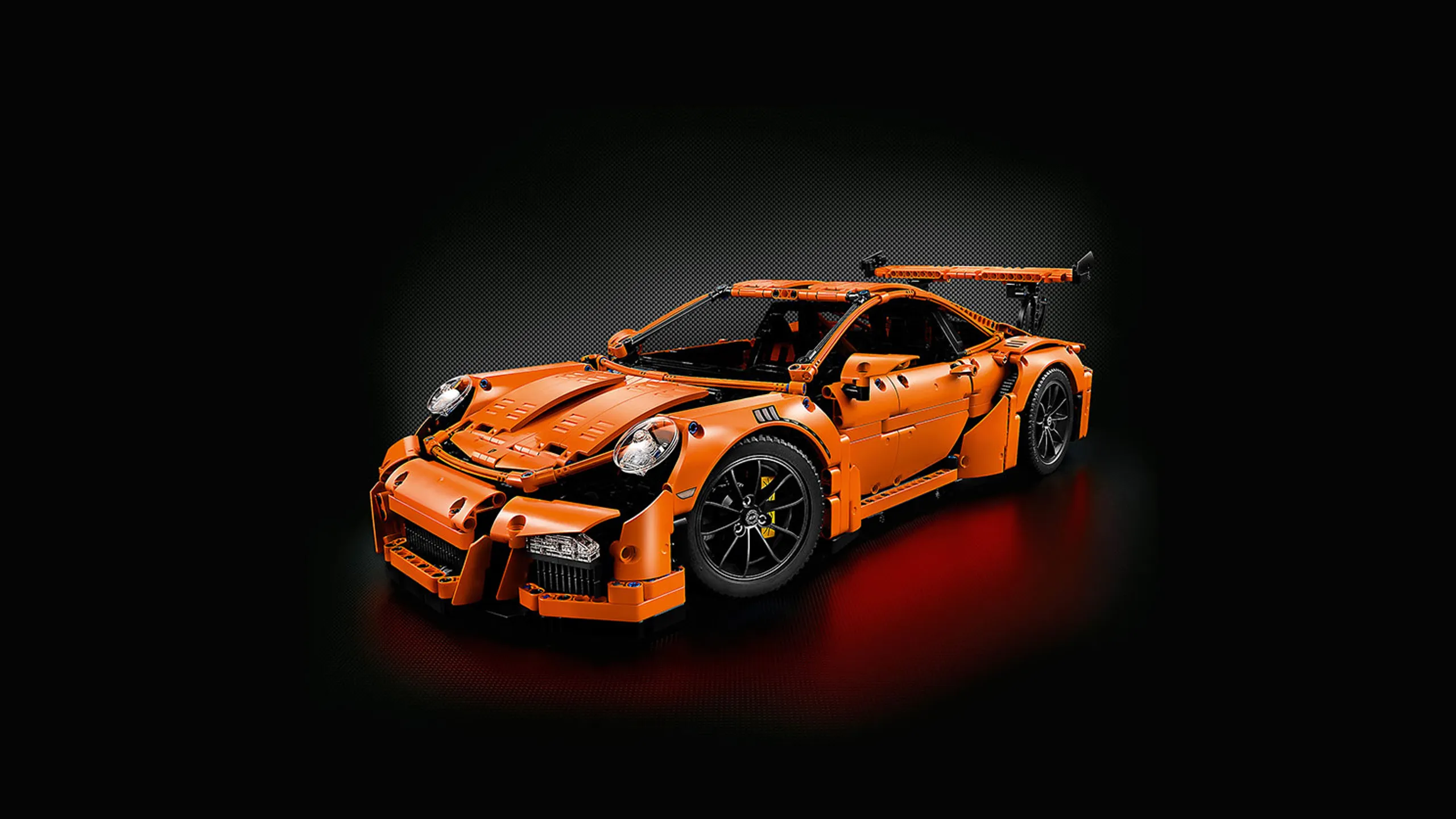 LEGO Technic - 42056 Porsche 911 GT3 RS - This streamlined orange LEGO Technic Porsche is packed with authentic features and functions that capture the magic of the iconic supercar.