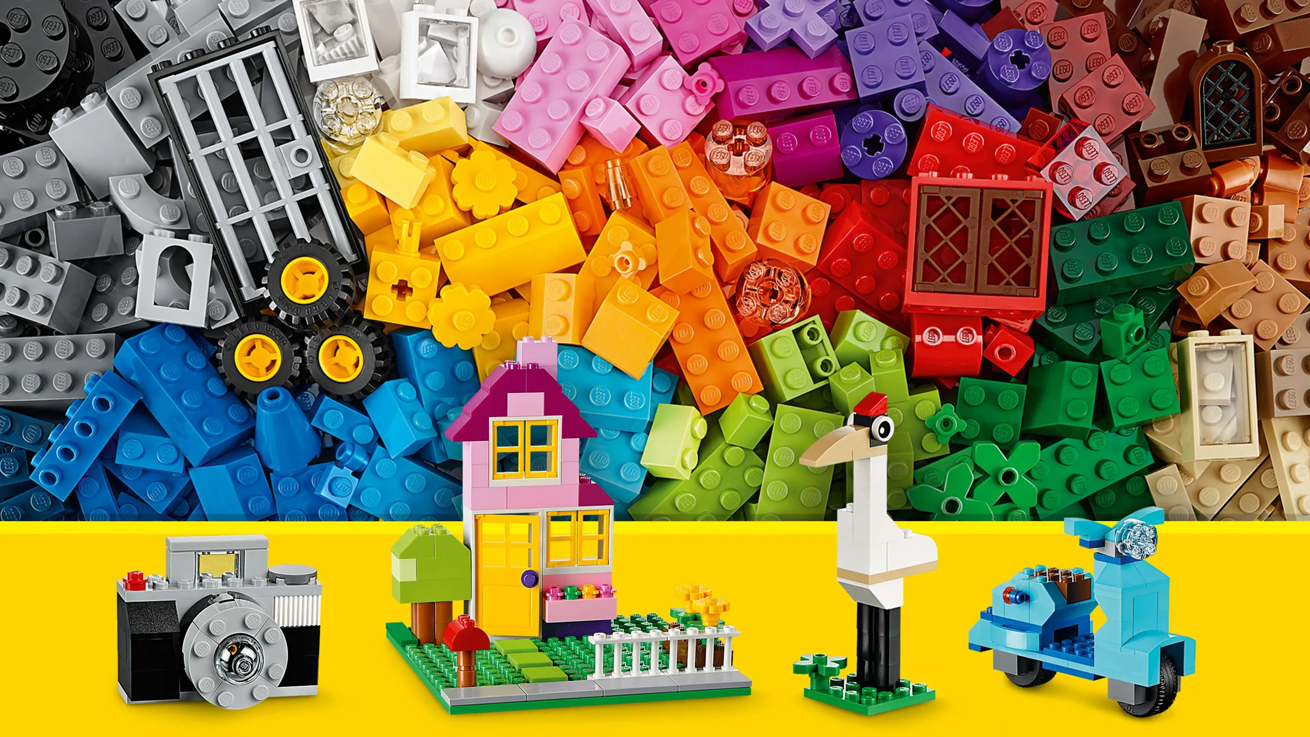 LEGO Classic Large Creative Brick Box - 10698 - Use a mix of blue, pink and white bricks to build a scooter, a house, a camera or a crane bird!
