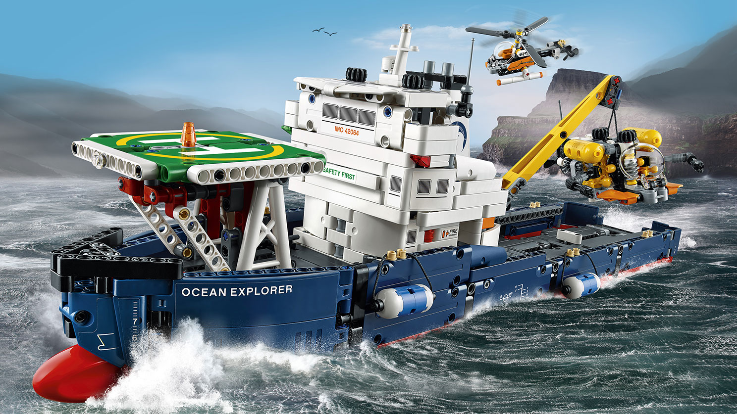 LEGO Technic - 42064 Ocean Explorer - The huge ship is in dark-blue, red and white colors, has a detailed hull with bulbous bow and two fenders, large captain’s bridge, crane and a landing pad, plus a submarine and a helicopter!