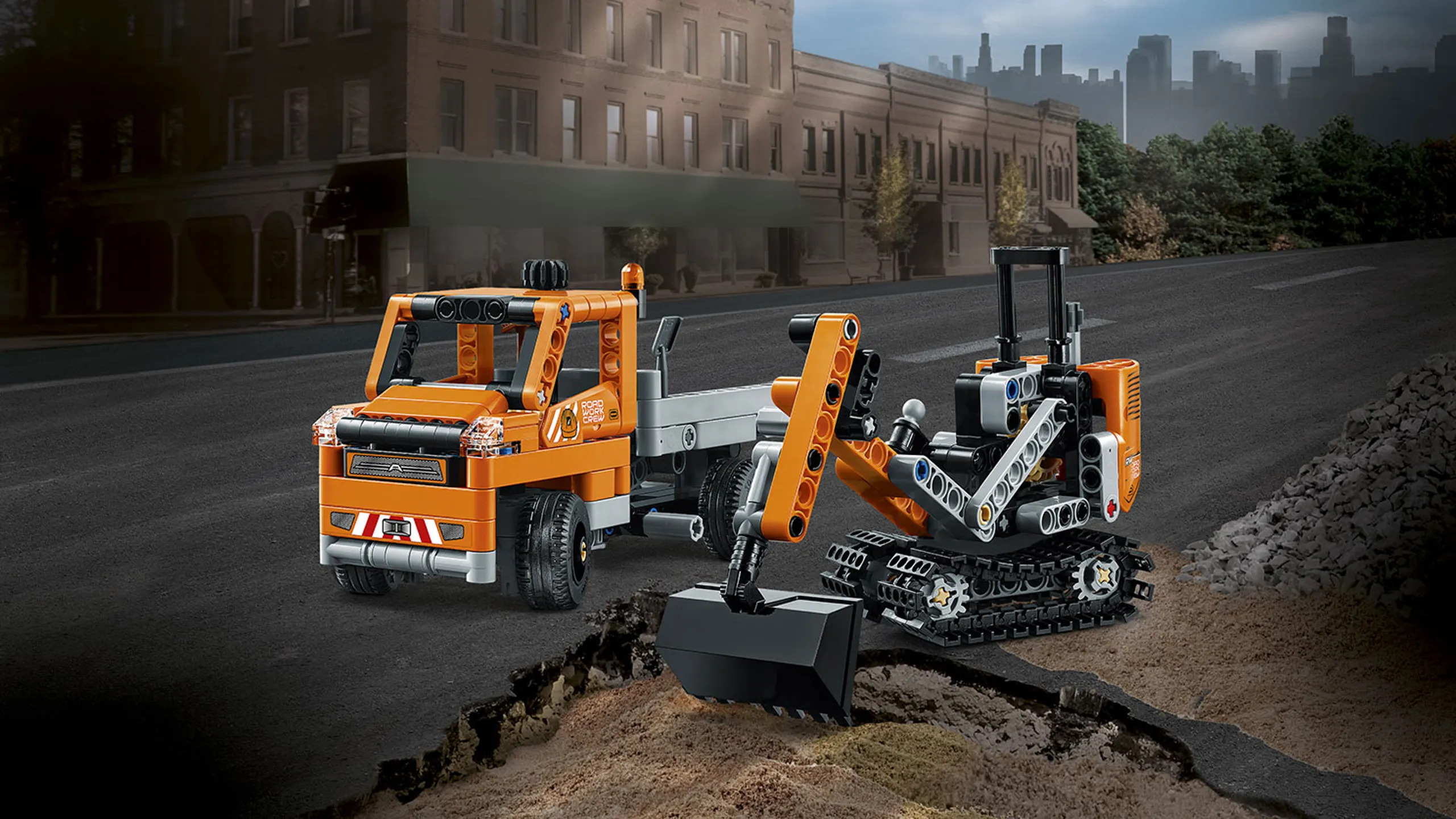 LEGO Technic - 42060 Roadwork Crew -  The set consists of a truck with removable trailer, plus a rugged tracked digger in a classic orange, gray and black color scheme. 