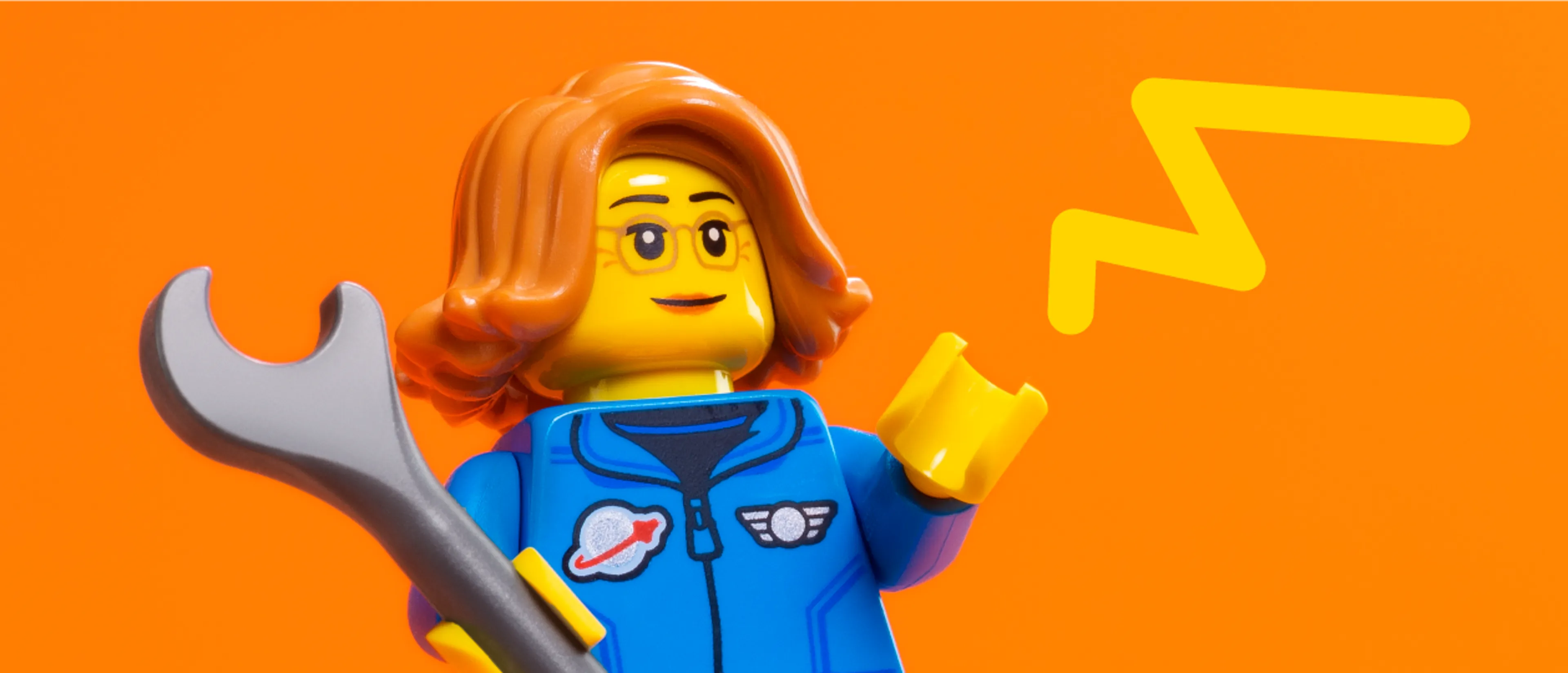 A minifigure holds a spanner