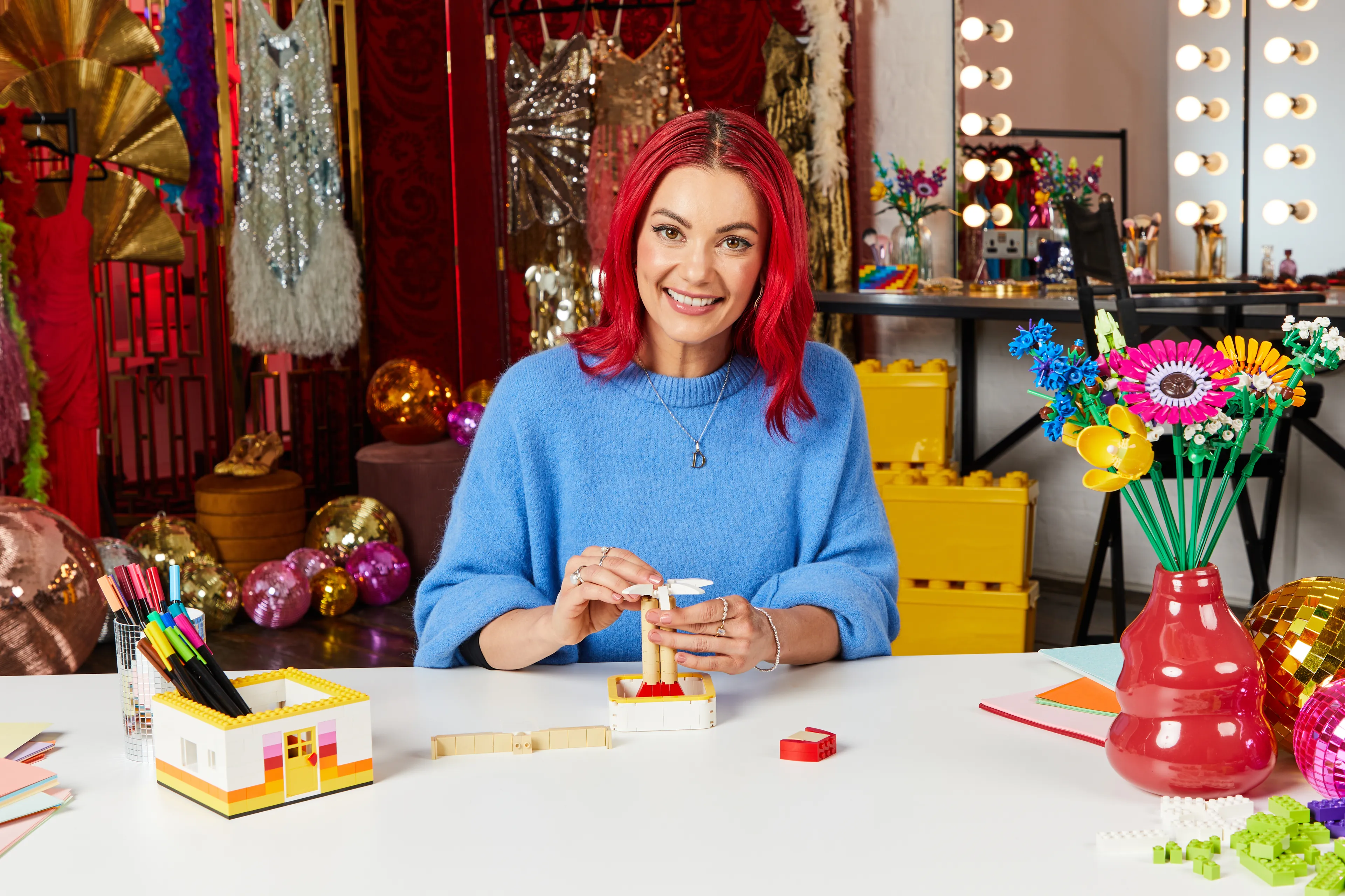 Dianne Buswell building with LEGO bricks