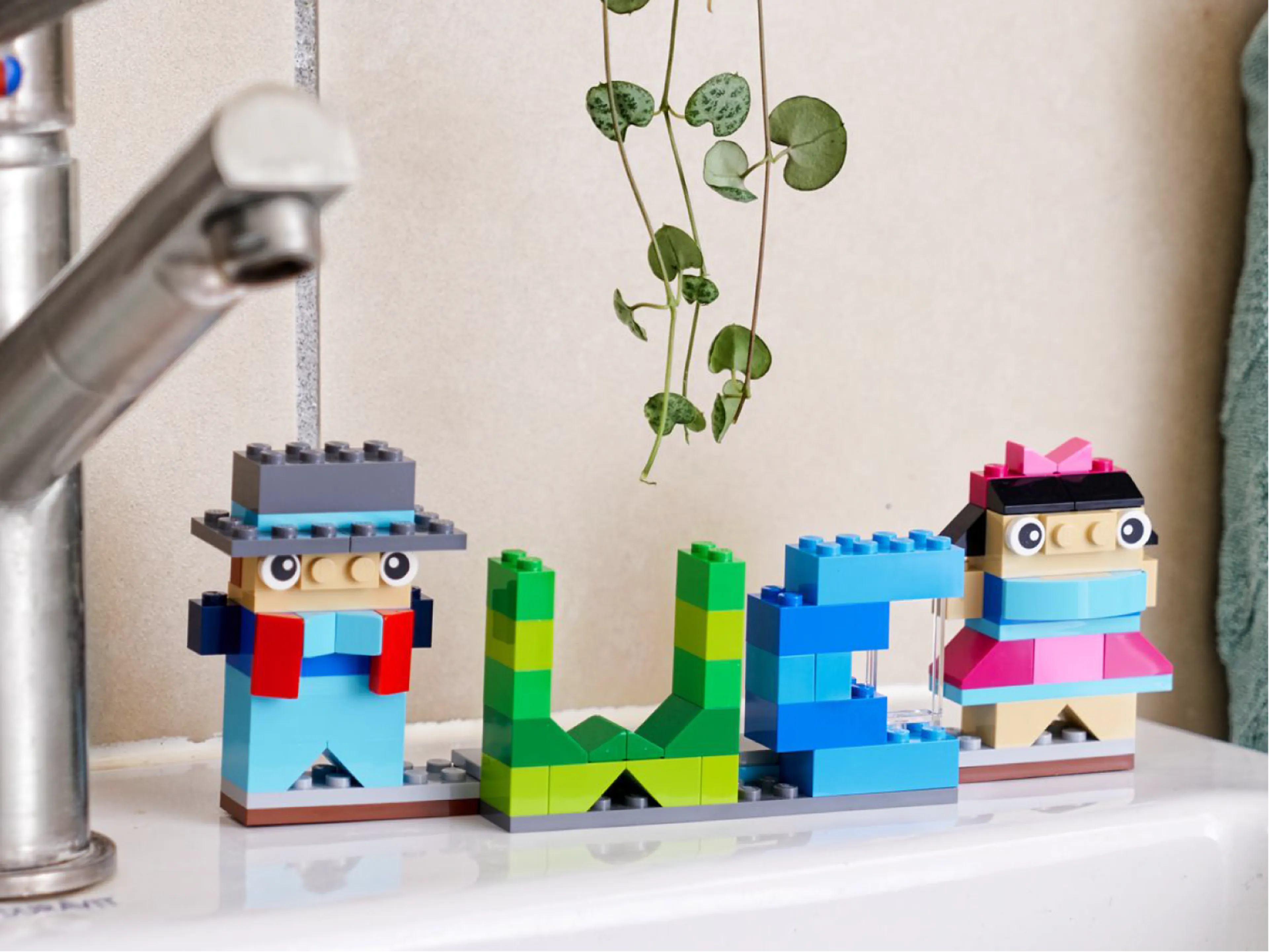 LEGO bricks in the shape of the letters WC