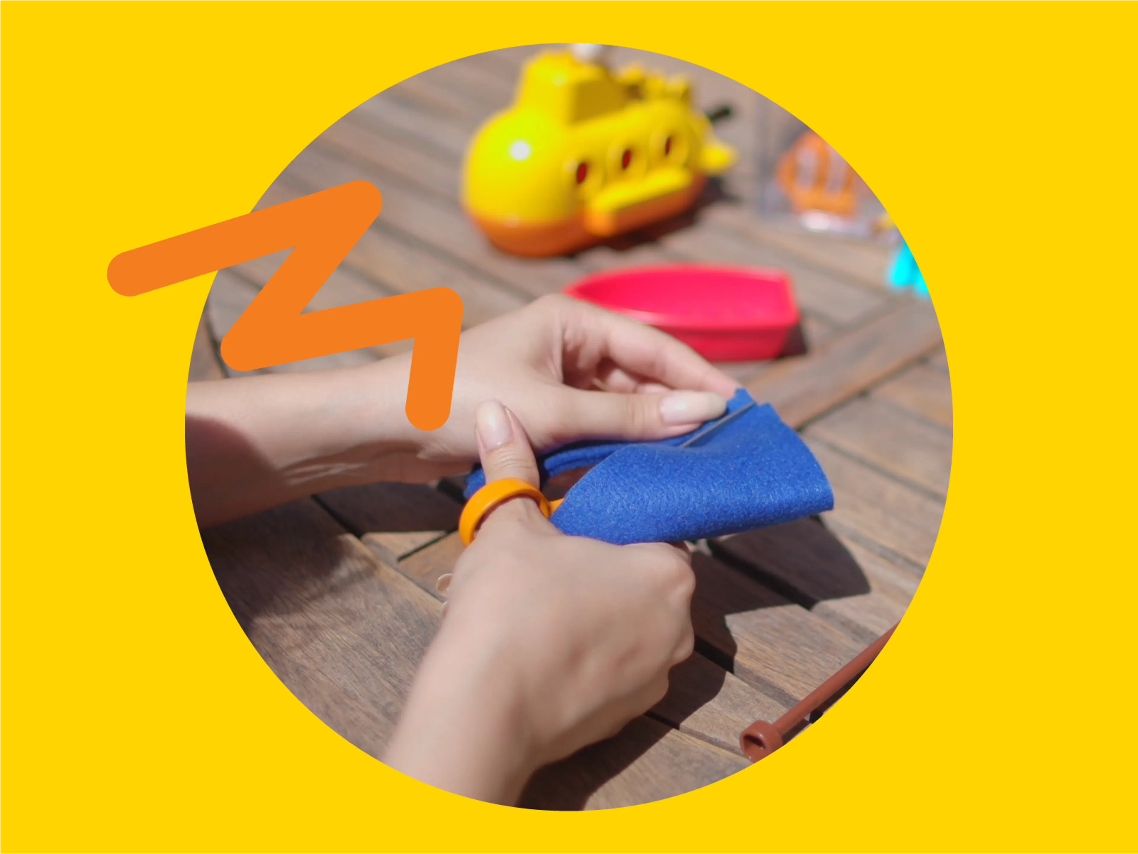 An image of someone cutting felt with scissors