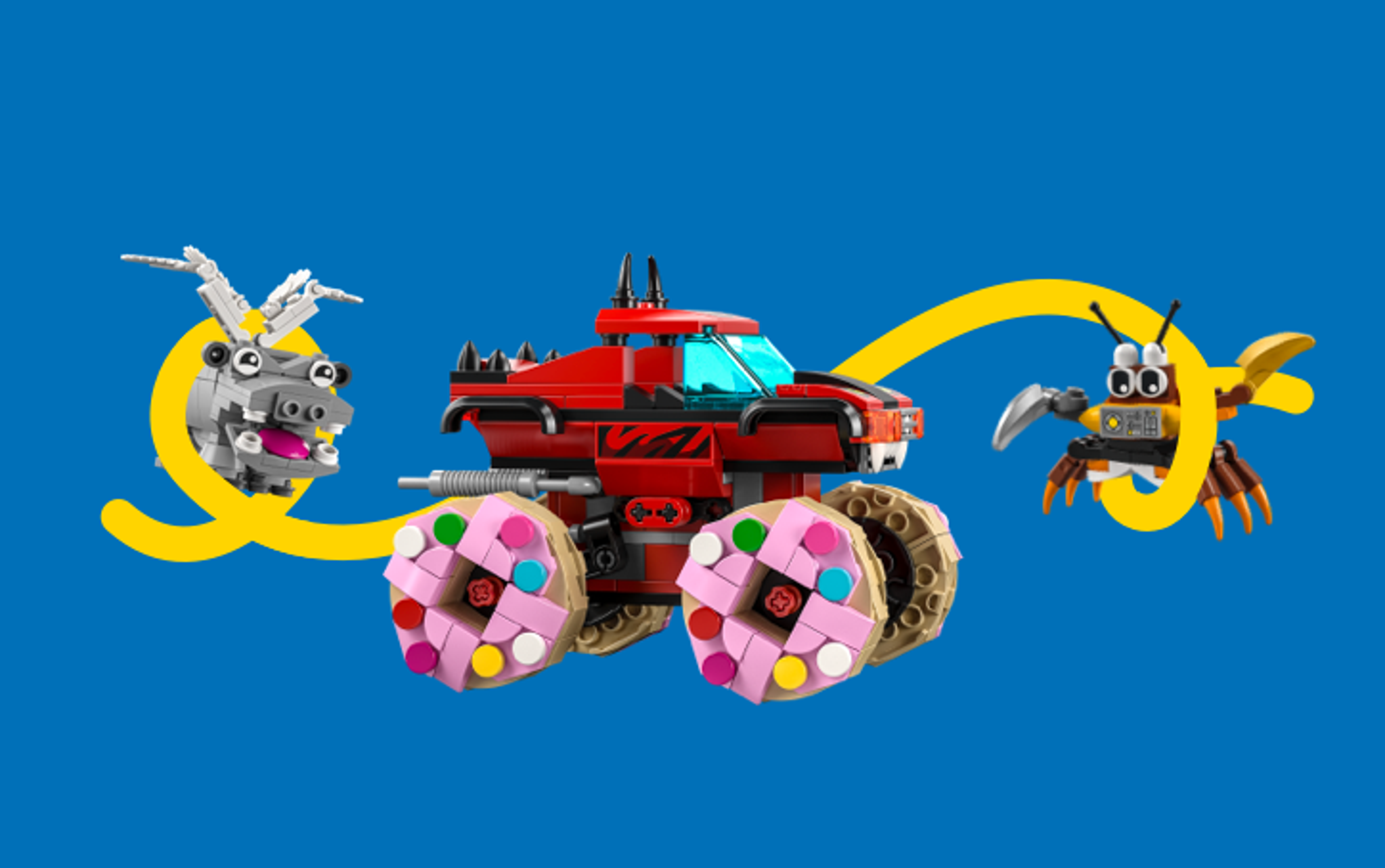A LEGO monster truck with donuts for wheels