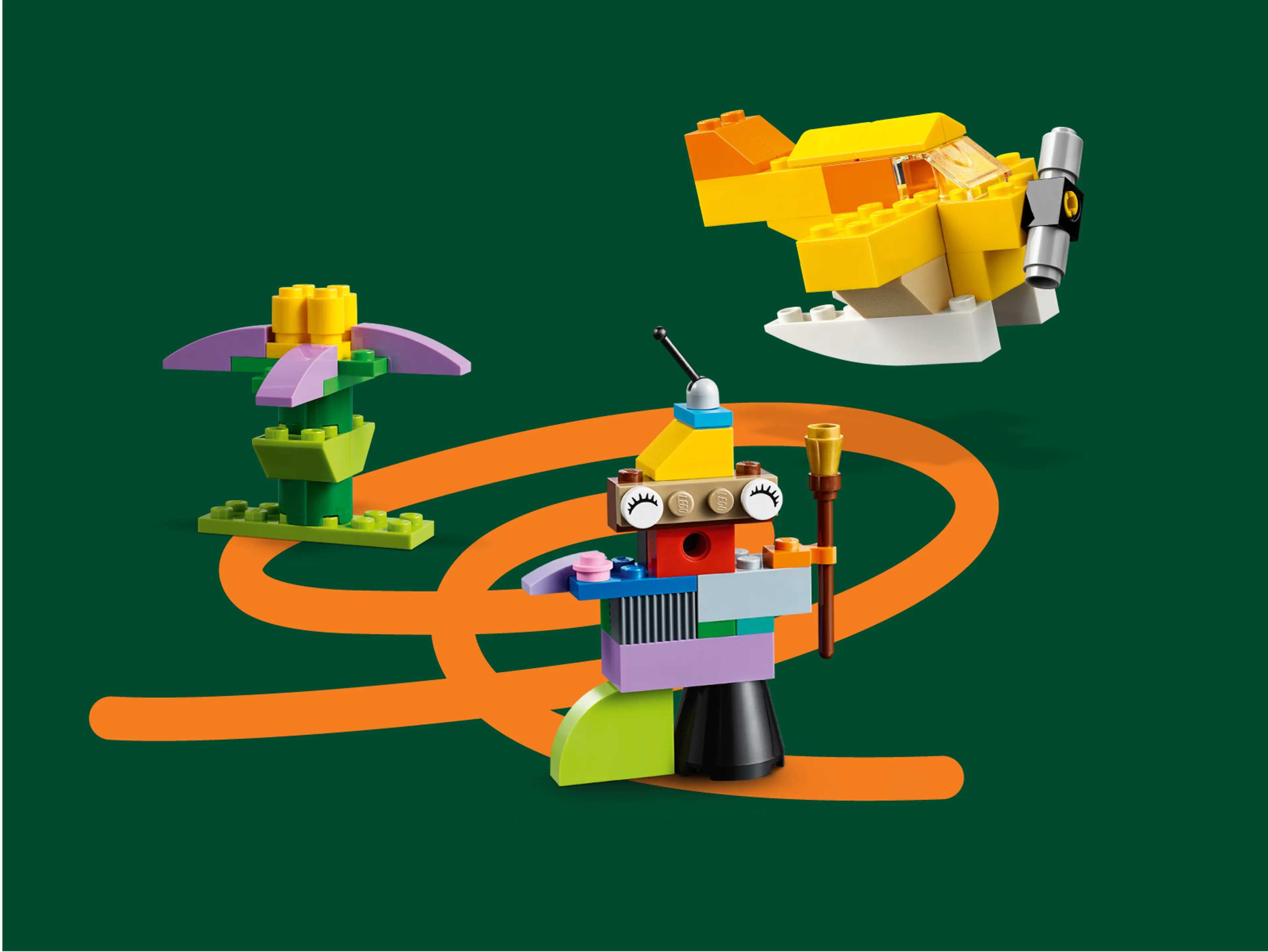Een kind en een vrouw spelen samen met LEGO steentjes