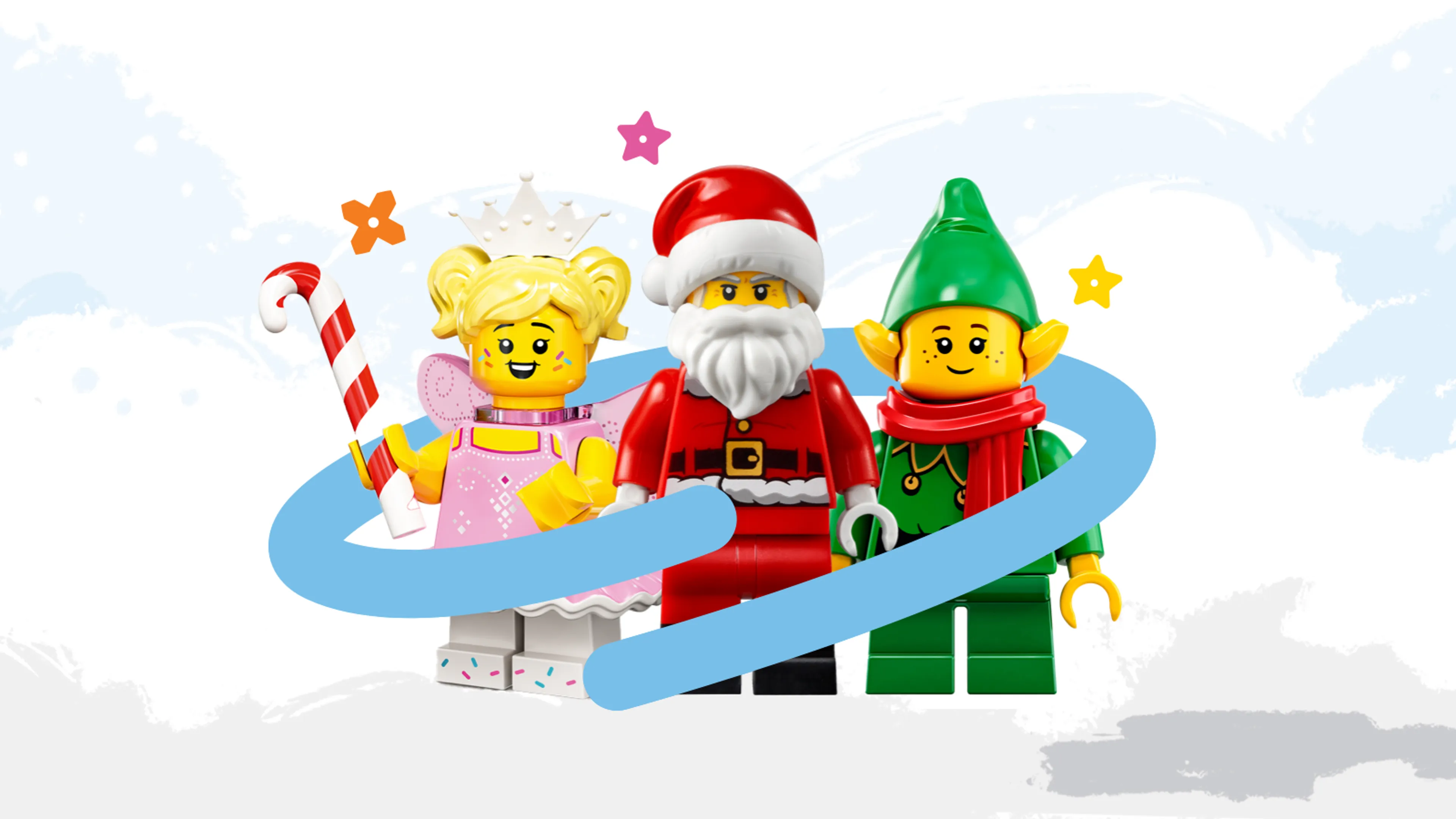 A fairy, a Santa and an elf minifigure