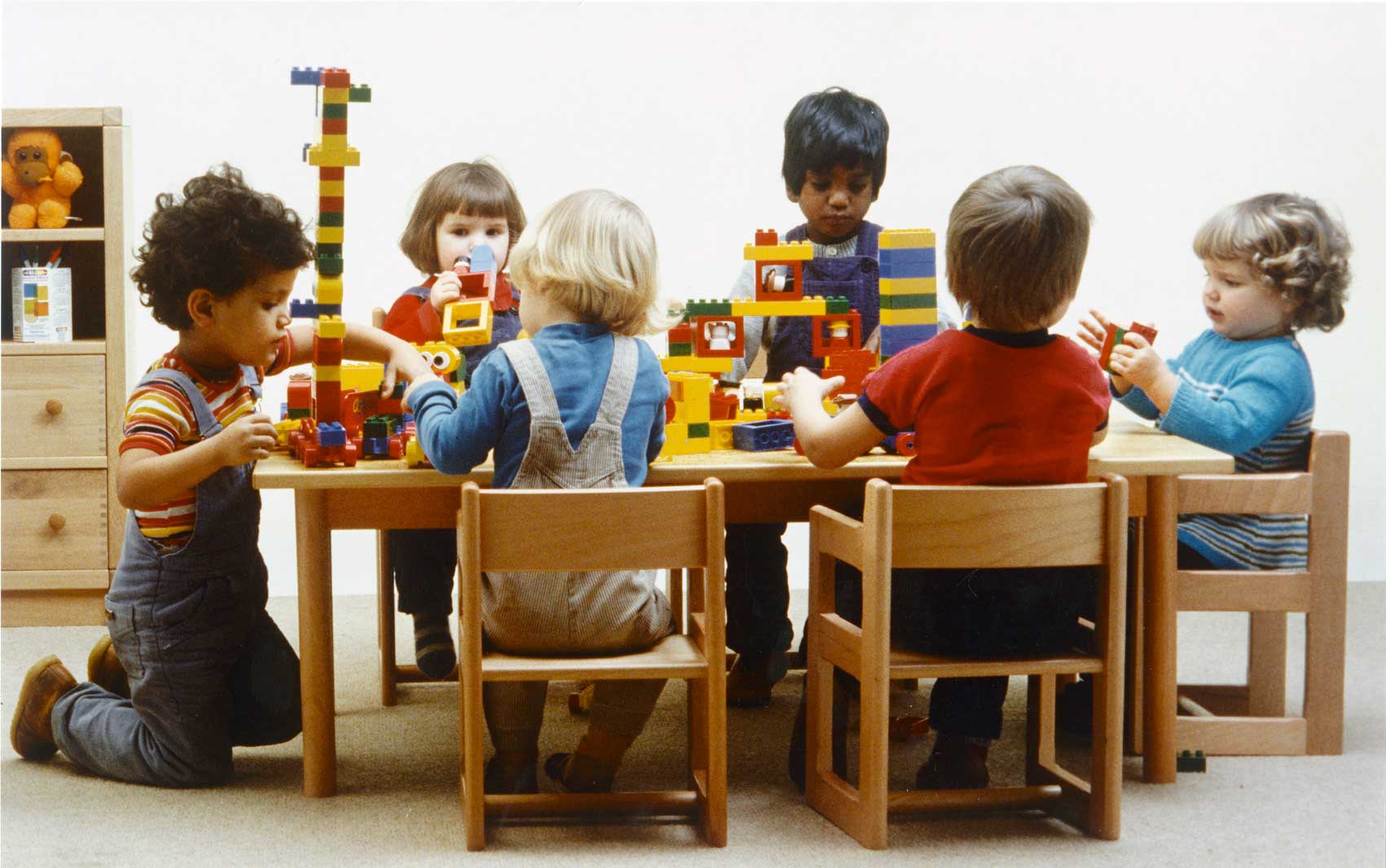 Children playing with DUPLO bricks