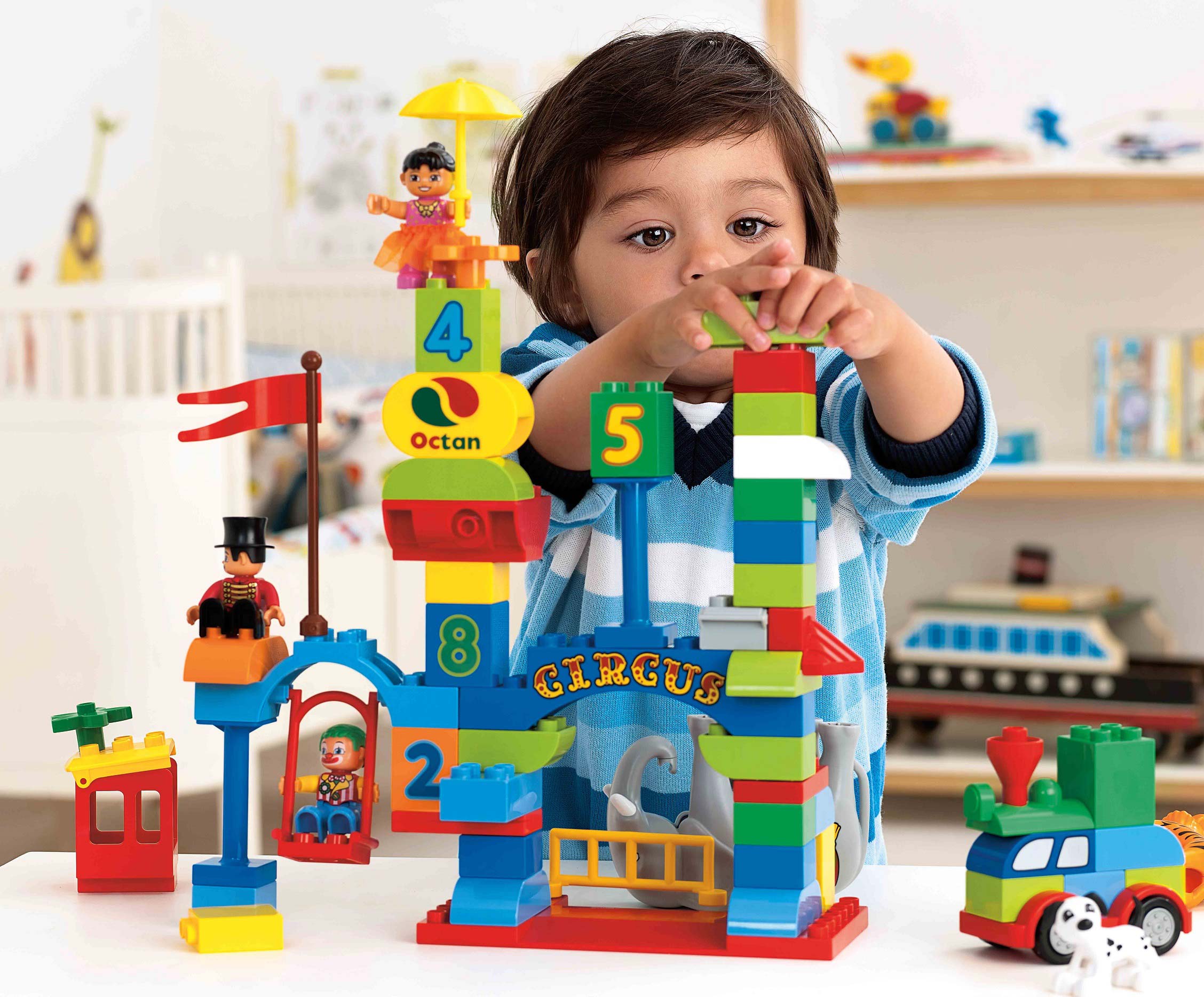 Child playing with LEGO DUPLO bricks