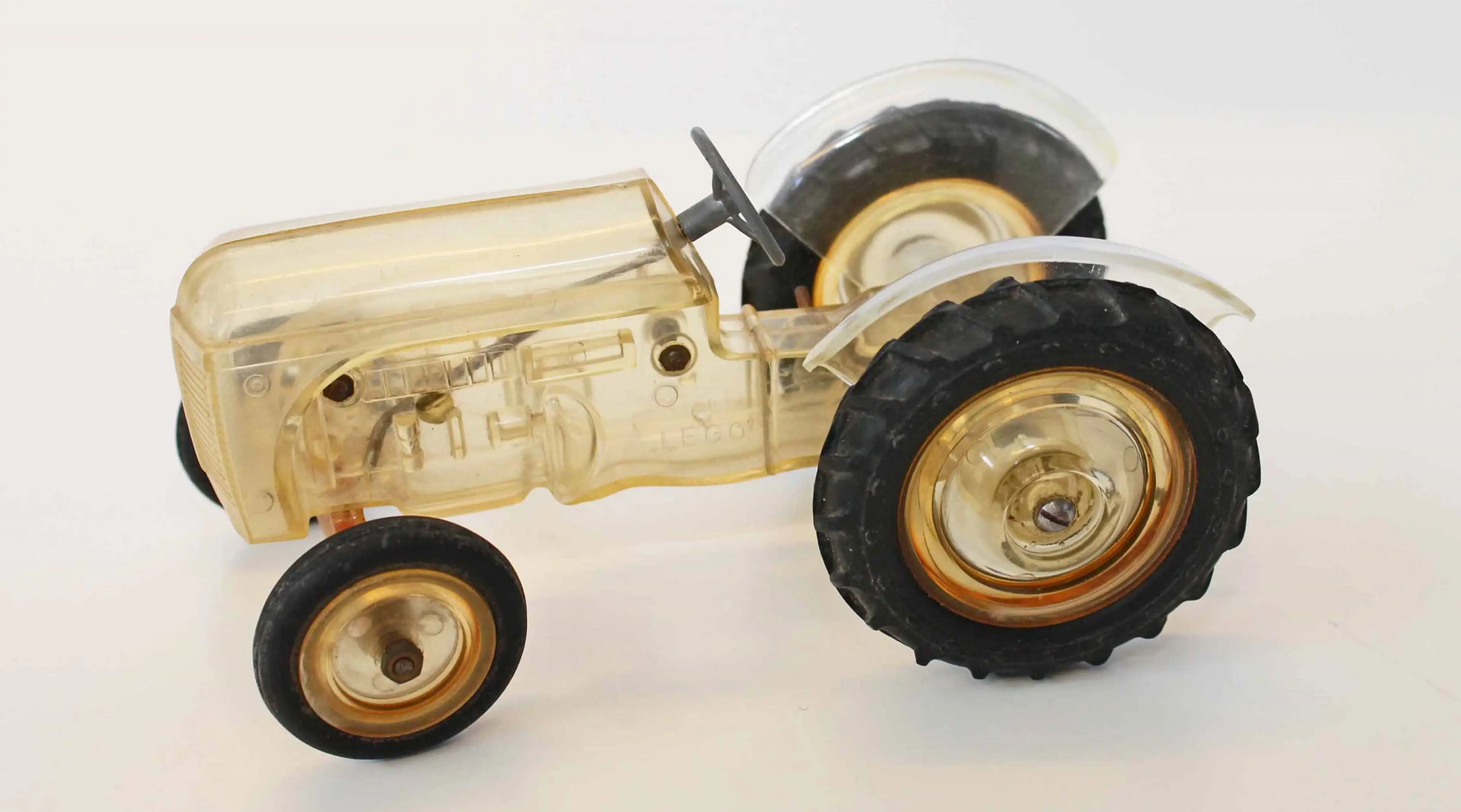 a LEGO Ferguson tractor in clear plastic