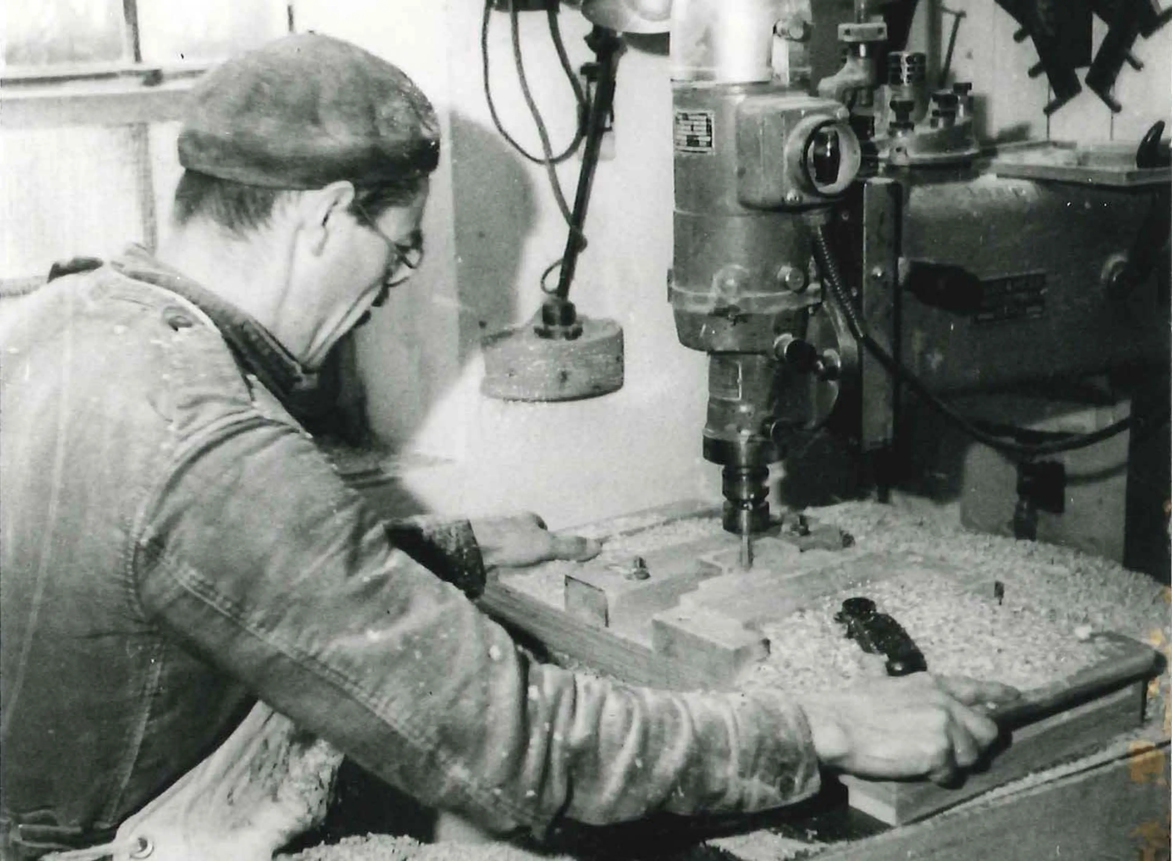 employee working a milling machine