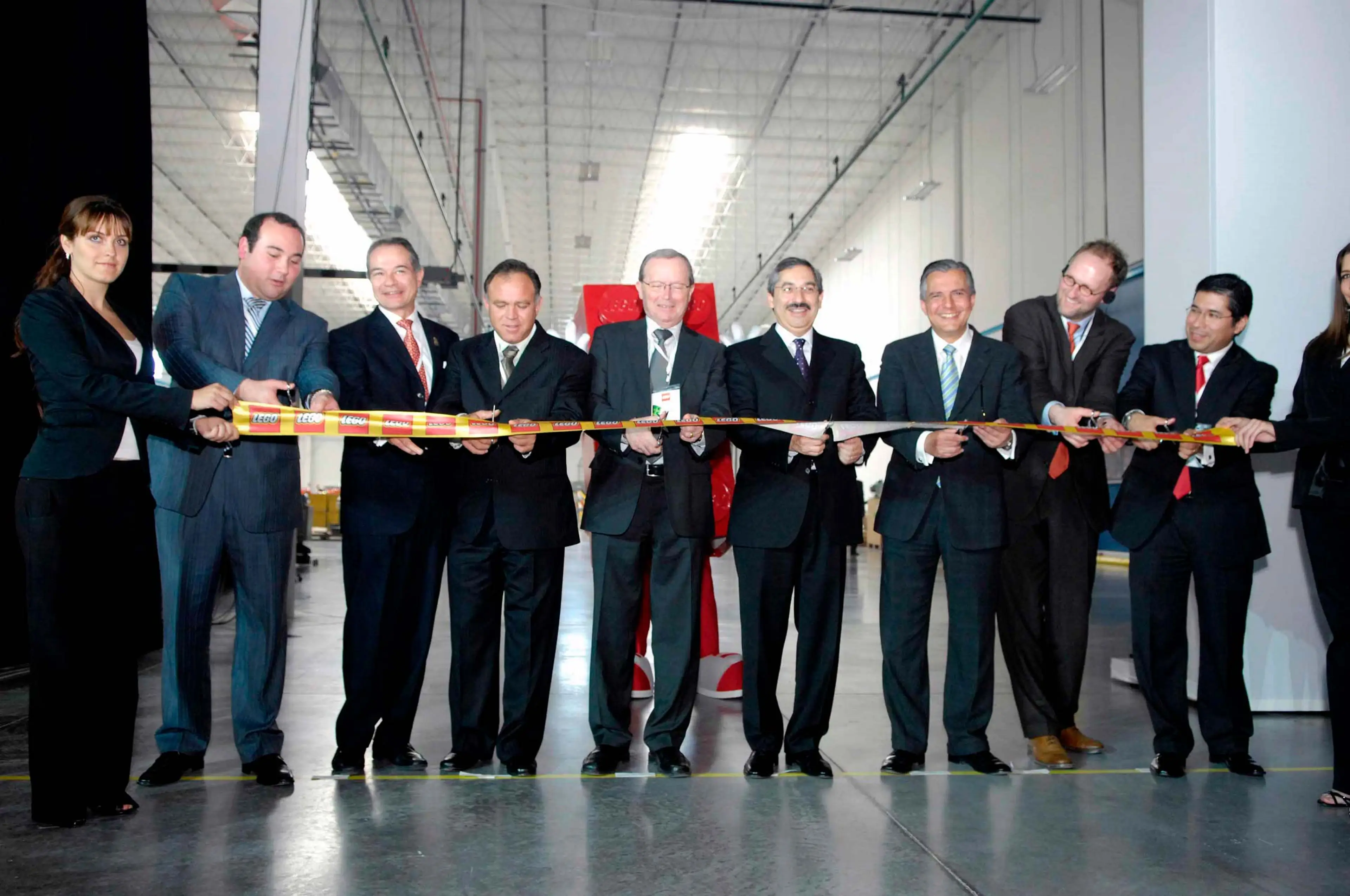 people cutting the ribbon at the opening ceremony of the factory in Monterrey
