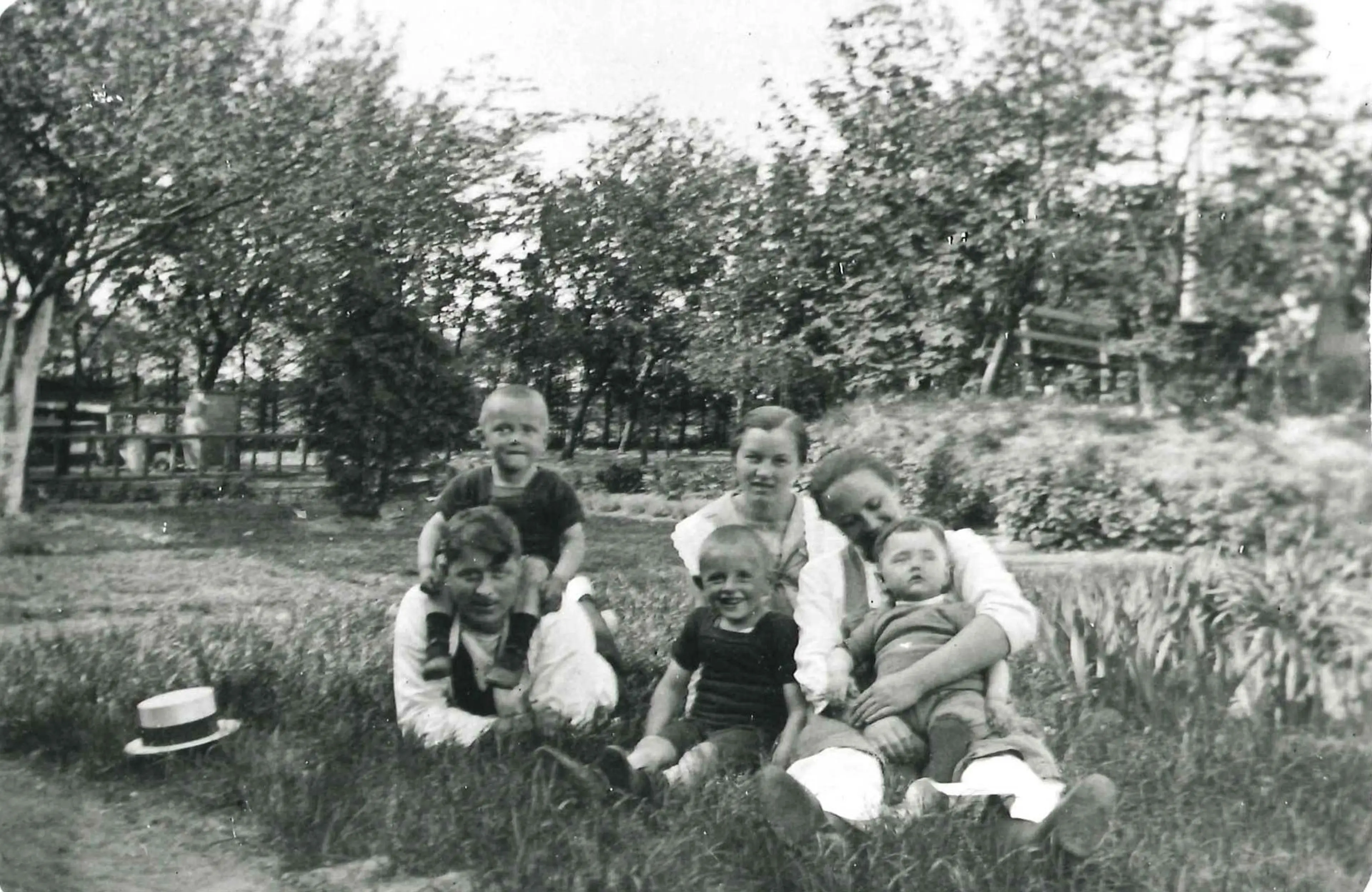The Kirk Kristiansen family sitting in the grass