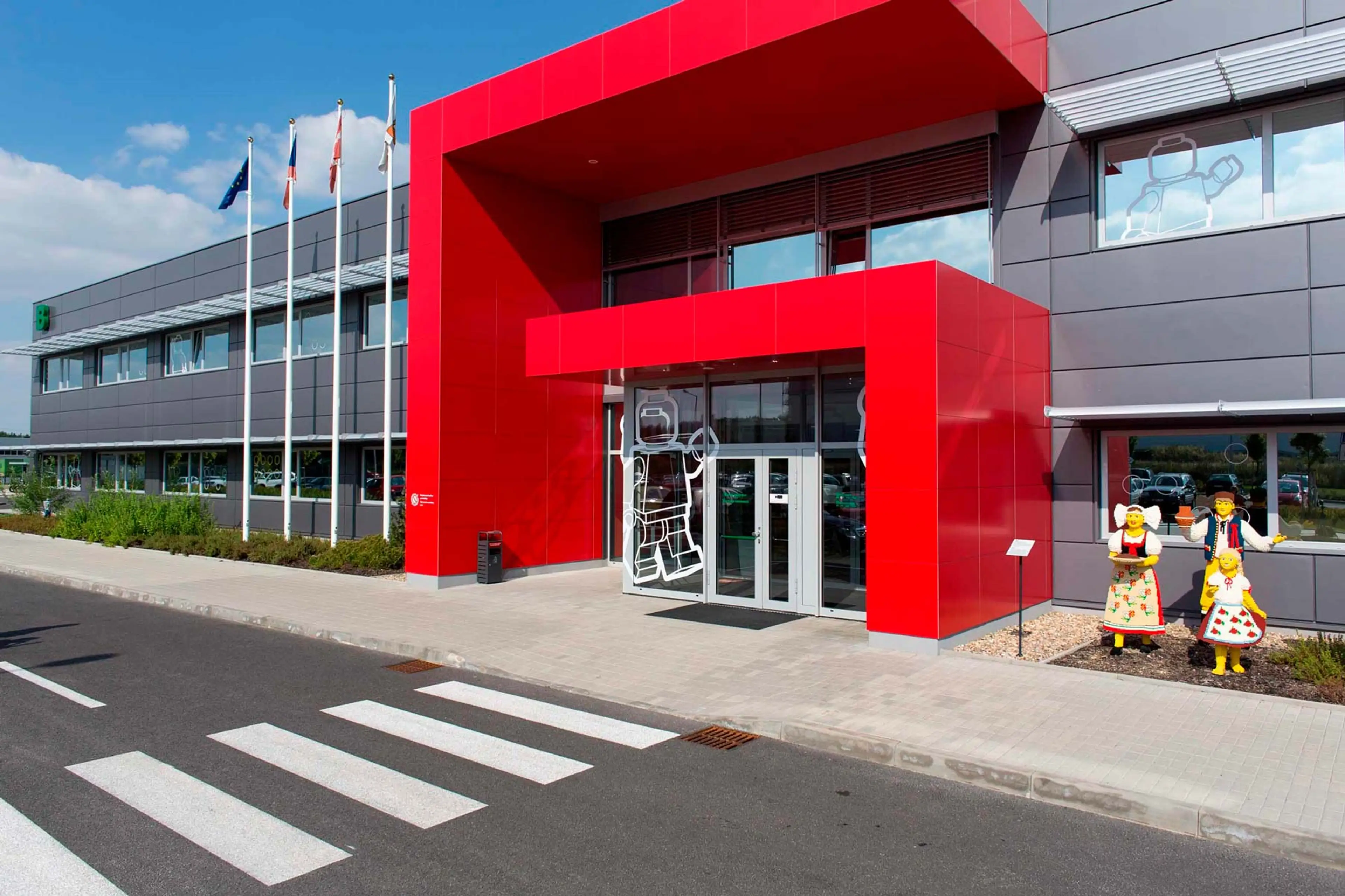 a brightly coloured red entrance to the LEGO factory in Kladno