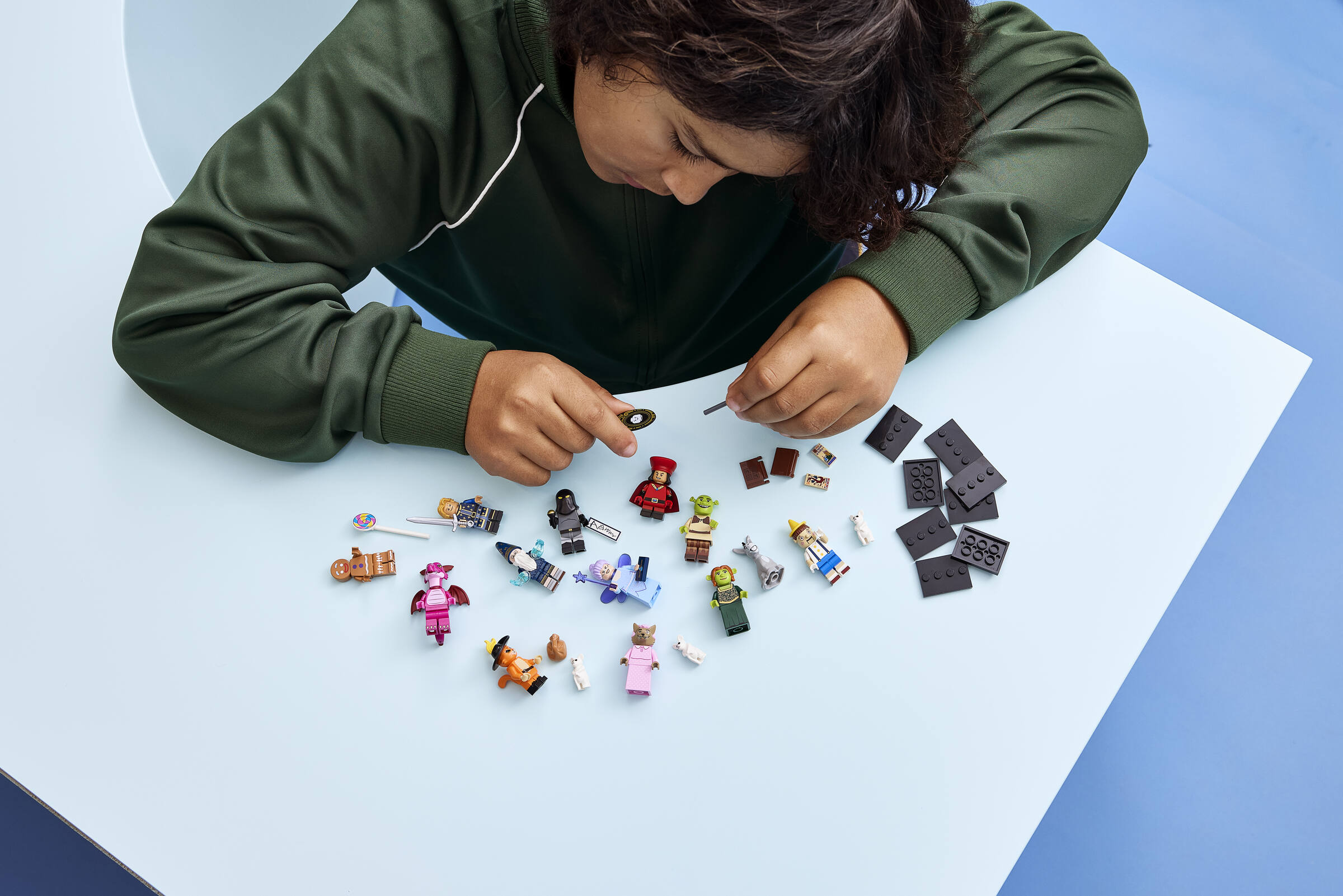 LEGO Minifigures Shrek Series 71053 collectible minifigures displayed in a lifestyle scene