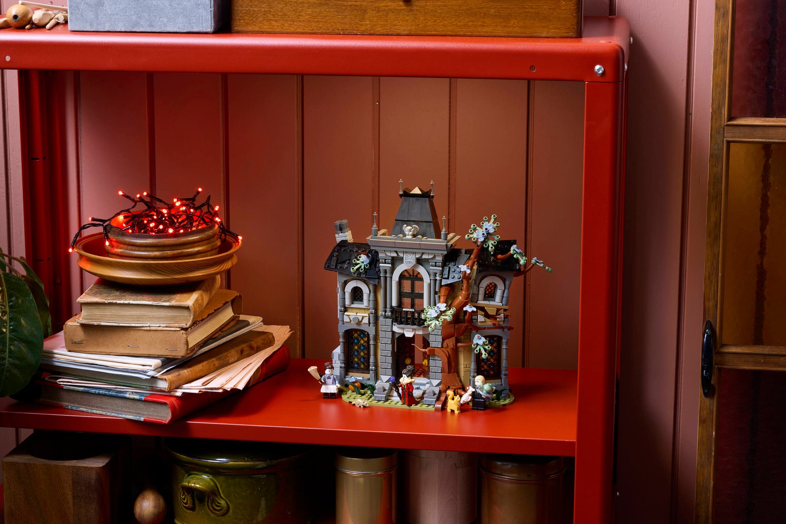 LEGO Icons Mayor Manor 11383 haunted house built model displayed in a spooky environment