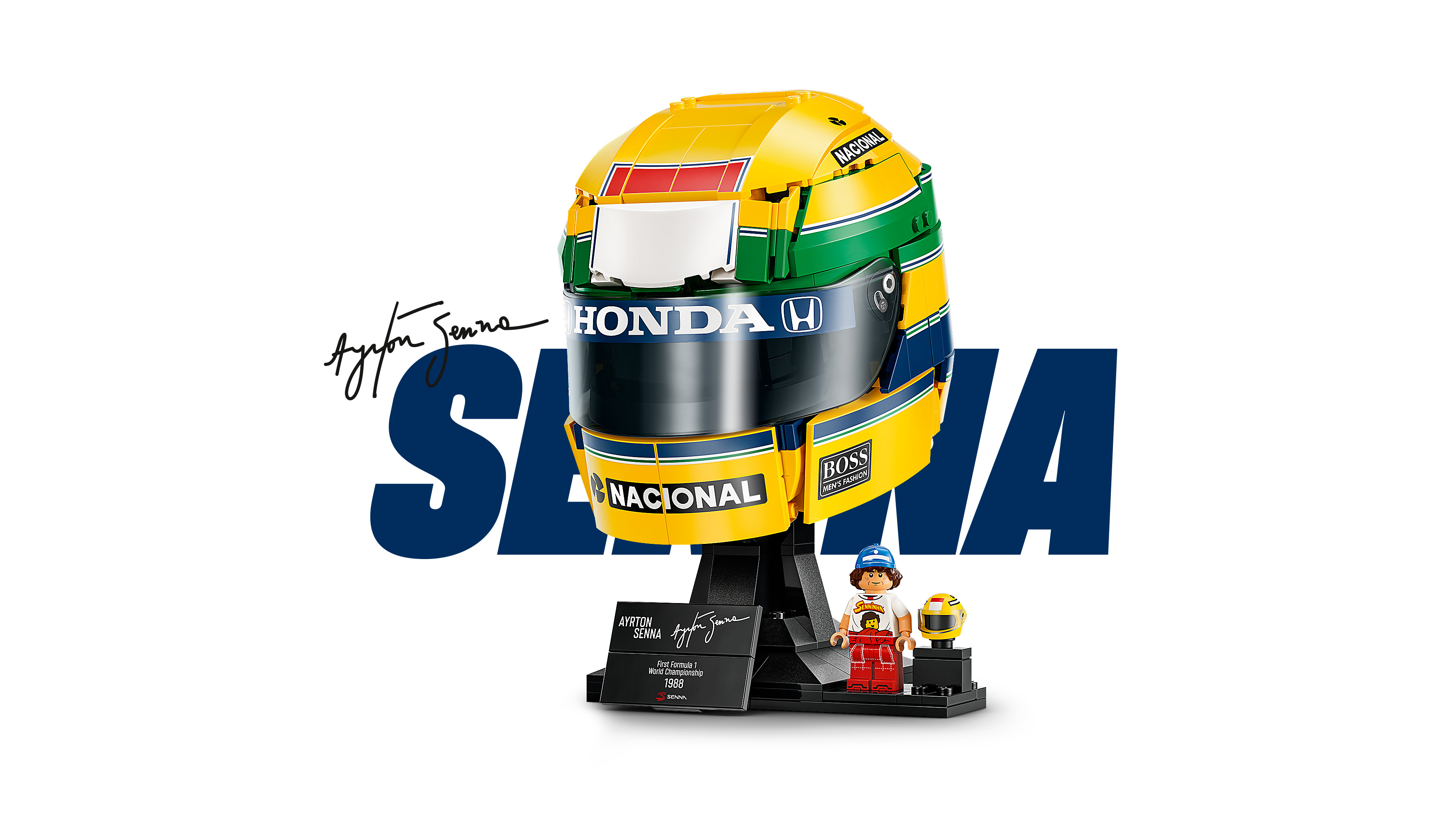 LEGO Editions 43024 Ayrton Senna Helmet product photo showing yellow and green livery and sponsor logos