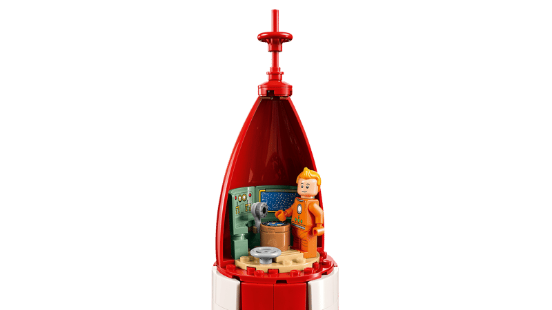 LEGO 21367 geoeffnete Raketenspitze mit Blick in den Kontrollraum und Tim Minifigur im Inneren