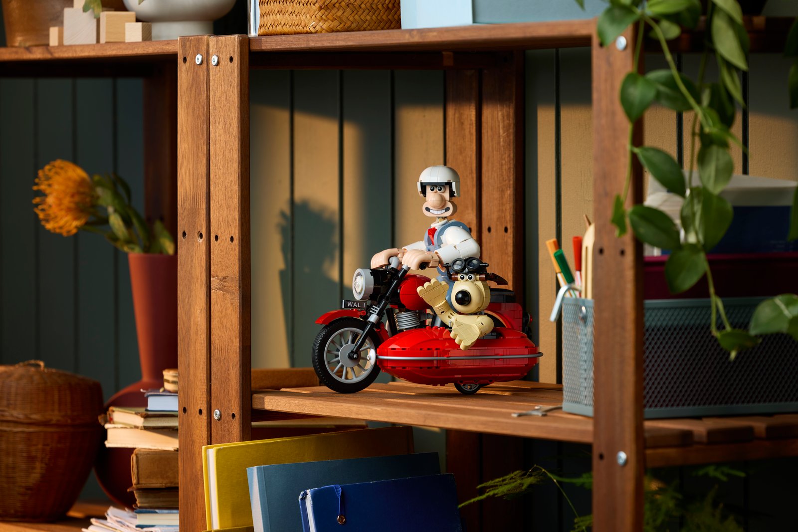 LEGO Ideas 21371 Wallace & Gromit motorbike and sidecar displayed in an environmental lifestyle scene
