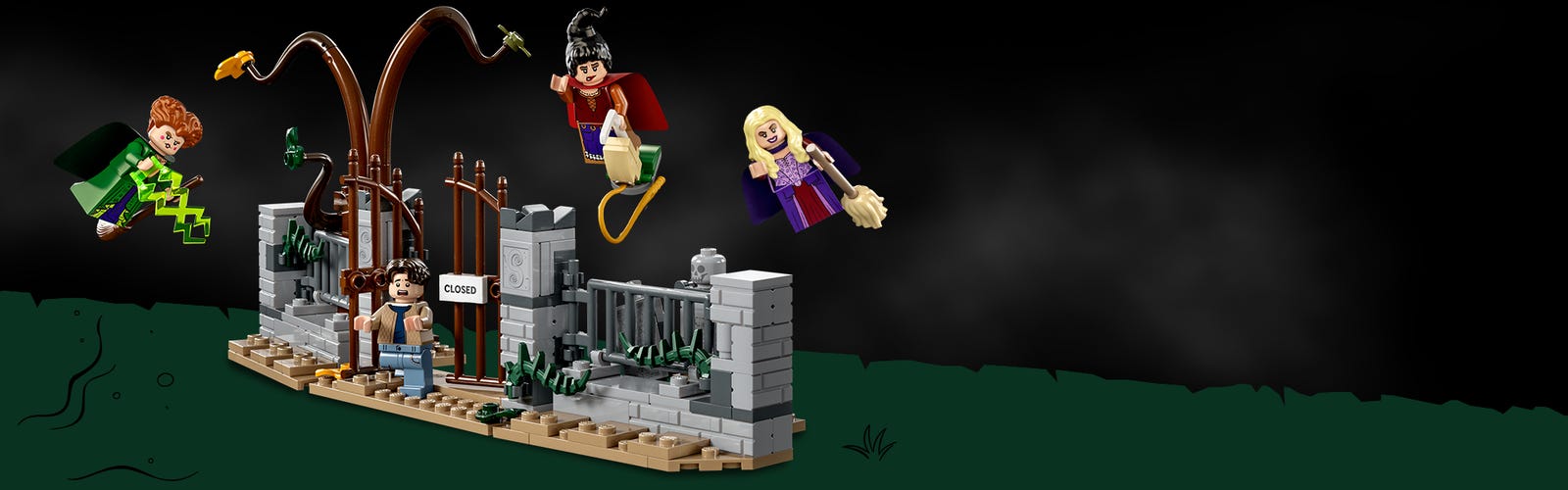 LEGO brick-built scene of a graveyard from the film Hocus Pocus with character minifigures flying above it