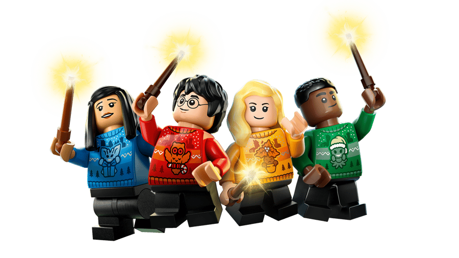 Four exclusive LEGO Harry Potter minifigures in Hogwarts Christmas sweaters holding lit wands, from advent calendar set 76456