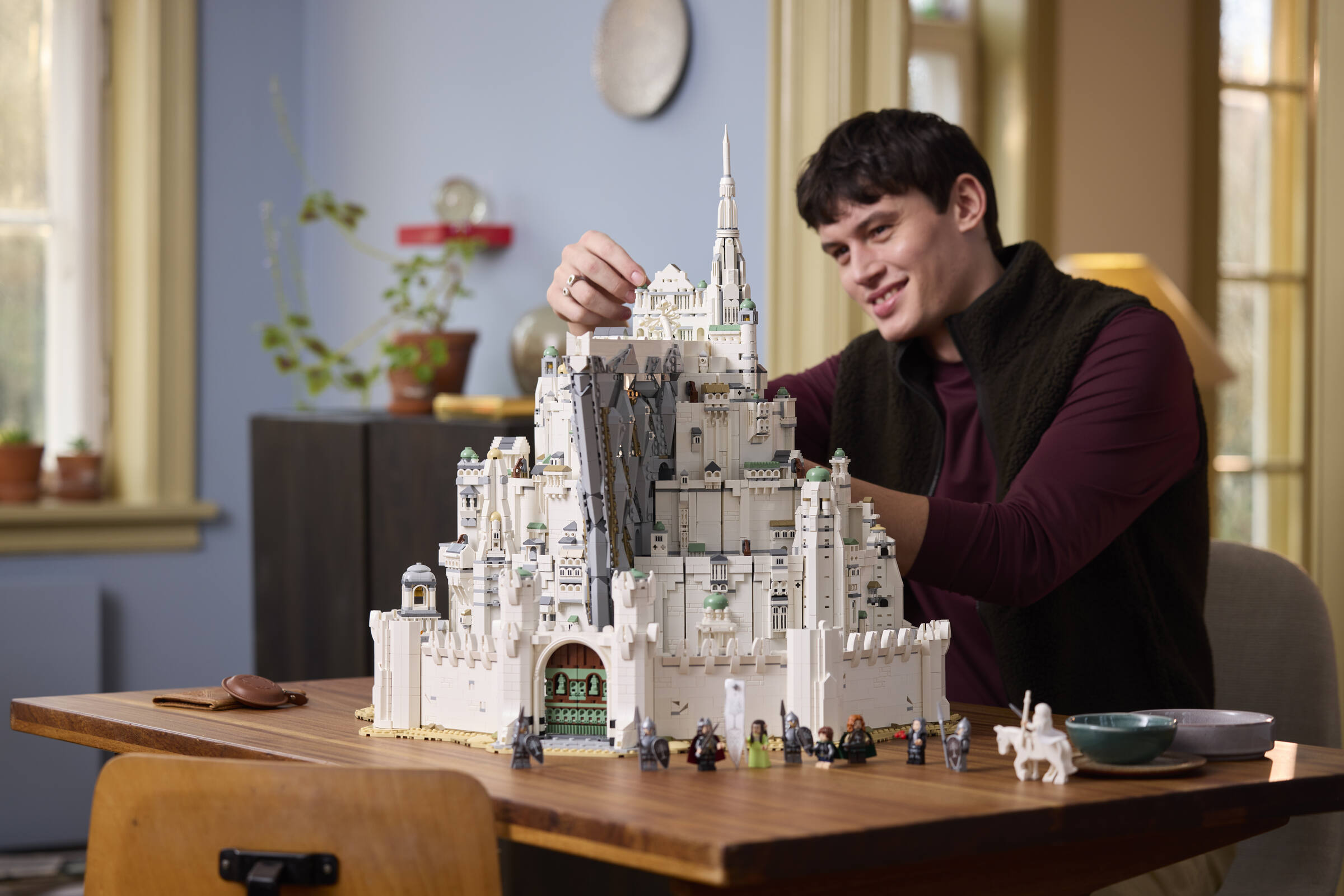 LEGO Icons The Lord of the Rings Minas Tirith 11377 lifestyle environment image — the towering White City model displayed in a dramatic setting