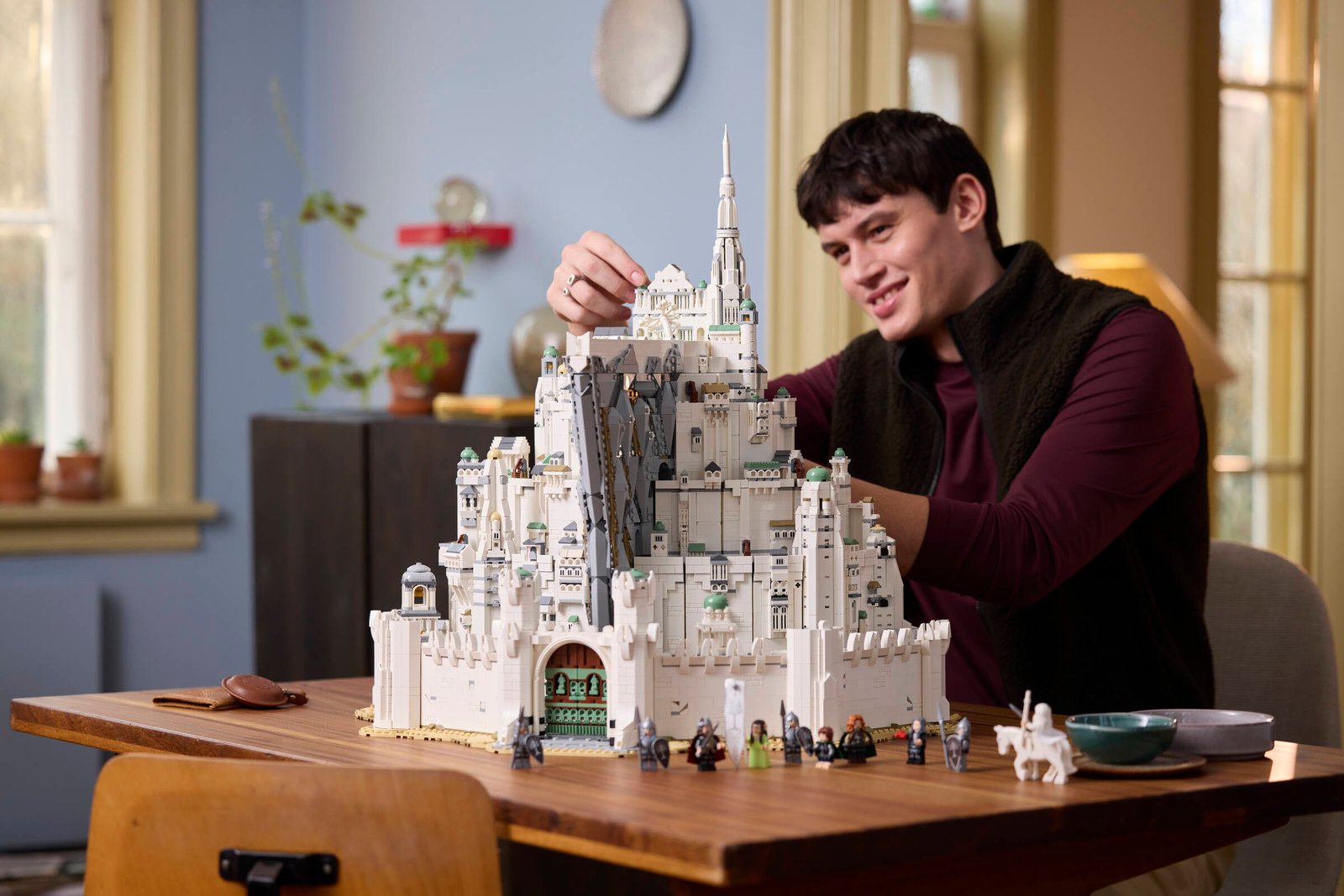 LEGO Icons The Lord of the Rings Minas Tirith 11377 lifestyle environment image — the towering White City model displayed in a dramatic setting