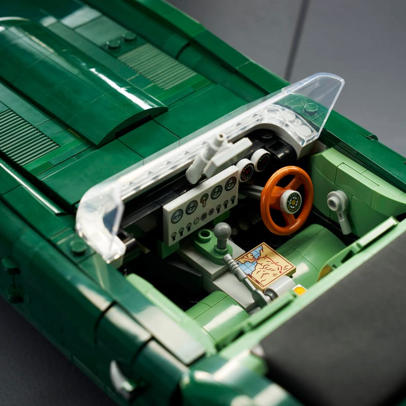 Close-up, aerial view of the cockpit and dashboard in a LEGO® Icons Jaguar E-Type set.