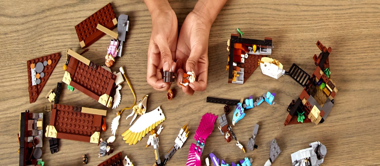 Newt Scamander's briefcase scattered on a table being assembled