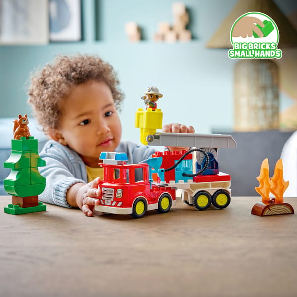 Fire Truck with Hose and Firefighter - Image 5