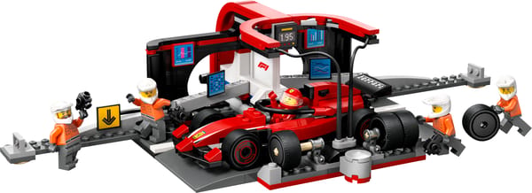 F1-pitstop og pitcrew med Ferrari-bil