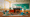 A LEGO build of a playful libraries, with animals, a slide and a book delivery boat.